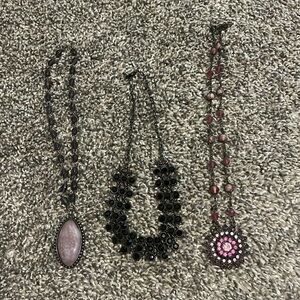 3 piece choker set. Purple, Black and Pink chokers.